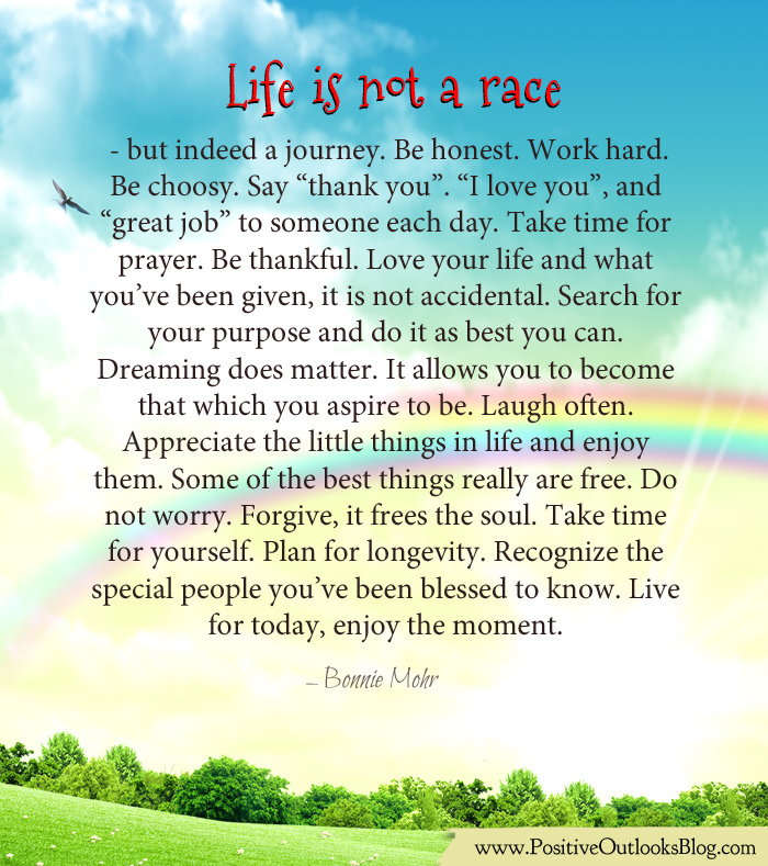 Man walking down road at sunset