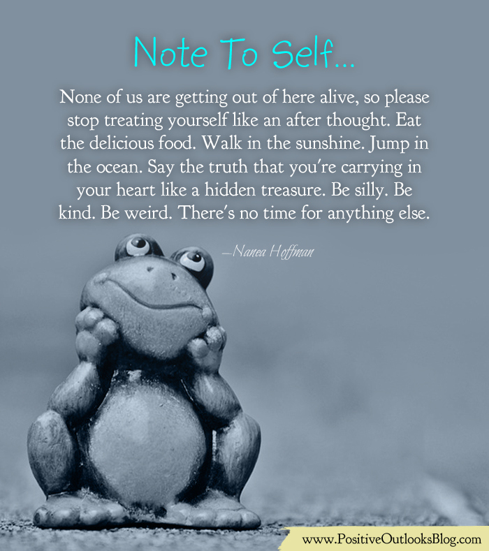 Man walking down road at sunset